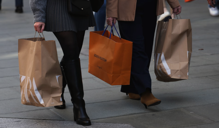 Retail sales growth in the UK is slowing down as shoppers hold off on spending until Black Friday deals