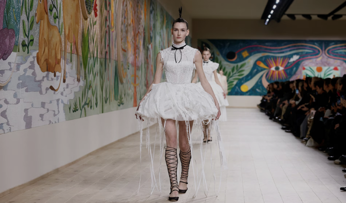 Dior gives a new twist to Lewis Carroll’s Alice for the modern “Brat” generation at Paris Fashion Week